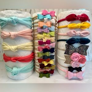 35 Infant/ Toddler Nylon/ Cotton Girl’s Multi-Colored Bow Headbands.